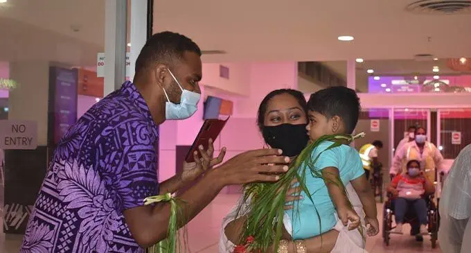 Sabeto villager, Qiokata Varo welcoming Bhaona Gosai and her son, Ishaan Shankar at the Nadi International Airport on Saturday night.