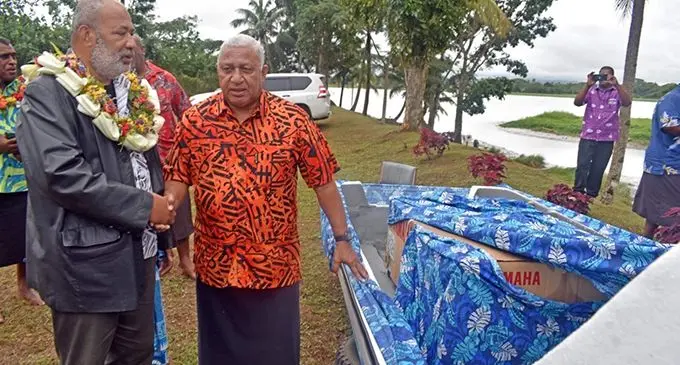Tui Vuci Ratu Anare Rasumusumu and Prime Minister Voreqe Bainimarama at the opening of two new staff quarters at the Ministry of Fisheries Wainibokasi Service Centre on June 25, 2020 and presentation of a fibreglass boat and outboard engine to Vuci Women’s Club.  Photo: Office of the Prime Minister