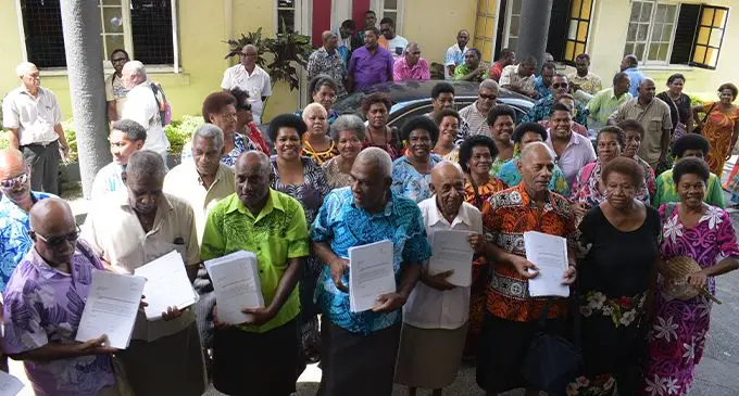 Suvavou villagers at the Suva City Council office in Suva this morning. Photo: Simione Haravanua.