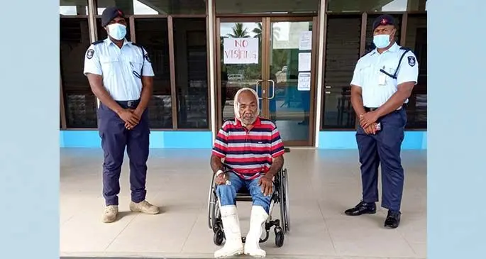 Police Constable Rosivela Nadibi (left) and Police Constable Jone Koroiduadua, with Kini Viliame Vasuikoro at the Navosa Hospital. Photo: Police Media Cell