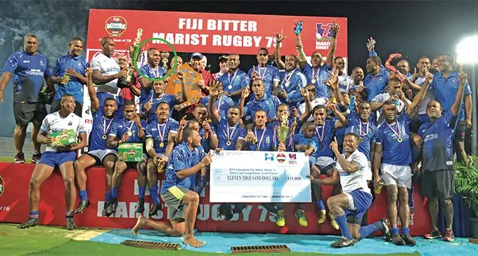 Captain and playmaker Livai Ikanikoda (circled) with Prime Minister Voreqe Bainimarama and the rest of the Police Blues after winning 43rd Fiji Bitter Marist 7s at ANZ Stadium on March 23, 2019. Photo: Ronald Kumar