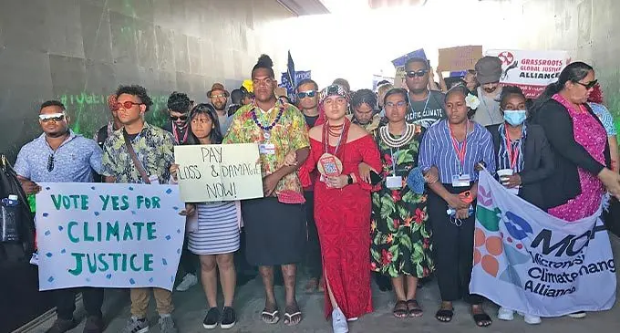 WE ARE NOT DROWNING, WE ARE FIGHTING… Pacific Island Youths joined youths from around the world during a protest March demanding climate justice at the COP27 venue in Sharm El-Shiekh, Egypt on November 13, 2022. Photo: Inoke Rabonu