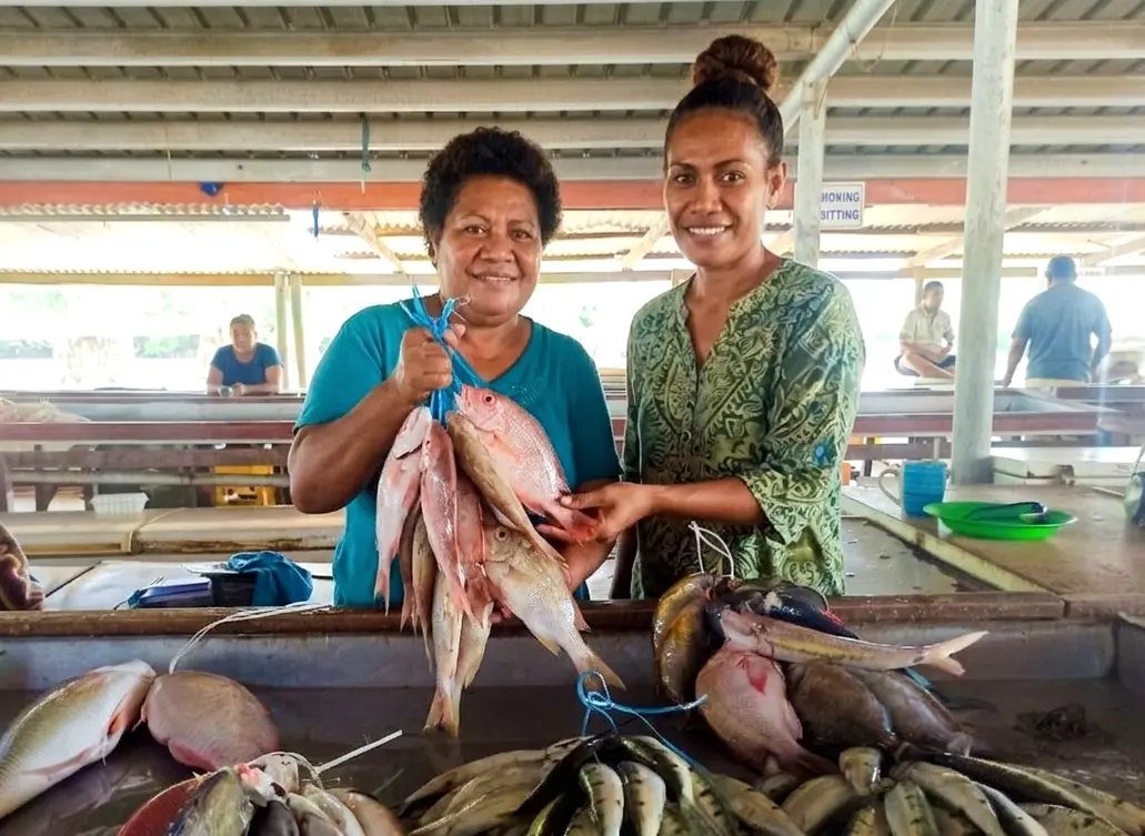 Tinai Laisani (left) with her daughter Losalini Masere at the Labasa Fish Market on June 25,  