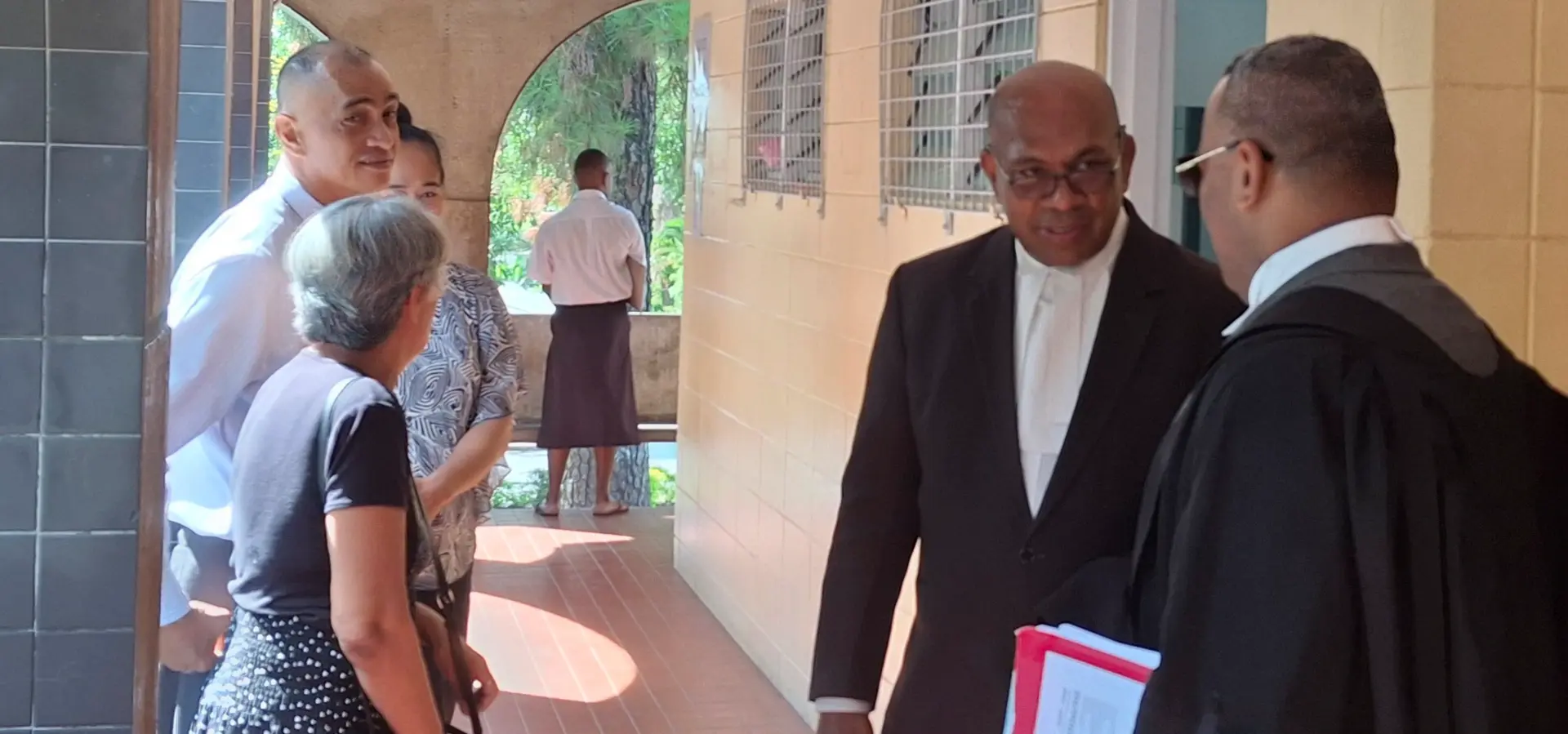 Fredrick Epeli with family members (right) and left are the two lawyers, Aca Rayawa and John Rabuku at High Court in Lautoka.