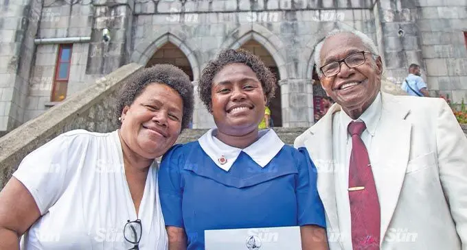 Newly-ordained deaconess of the Methodist Church of Fiji Mereseini Laqekoro with her parents Salimoni Laqekoro and Lice Nailelai after the ordination service at the Centenary Church in Suva on November 28, 2021. Photo: Leon Lord