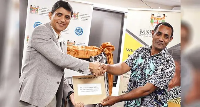 Permanent Secretary for Commerce, Trade, Tourism and Transport, Shaheen Ali with Josefa Tagica. Photo: Ministry of Commerce, Trade, Tourism and Transport