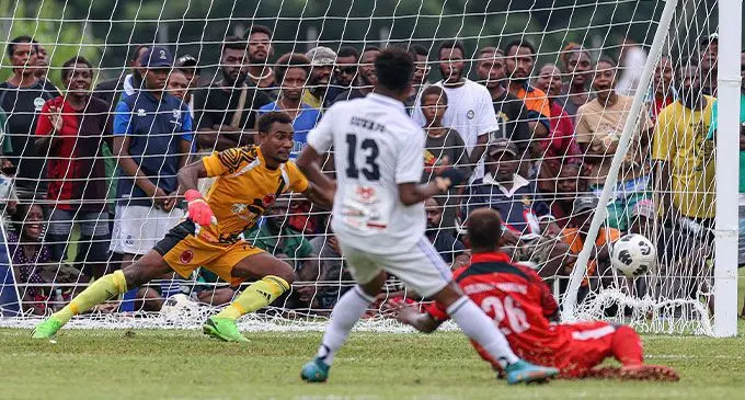 Photo caption: Suva striker Azariah Soromon (13) slots the ball past Solomon Warriors goalkeeper Joseph Komu during their Group A clash in Luganville, Vanuatu, on May 20, 2023. Suva won 2-0. Photo: OFC Media 