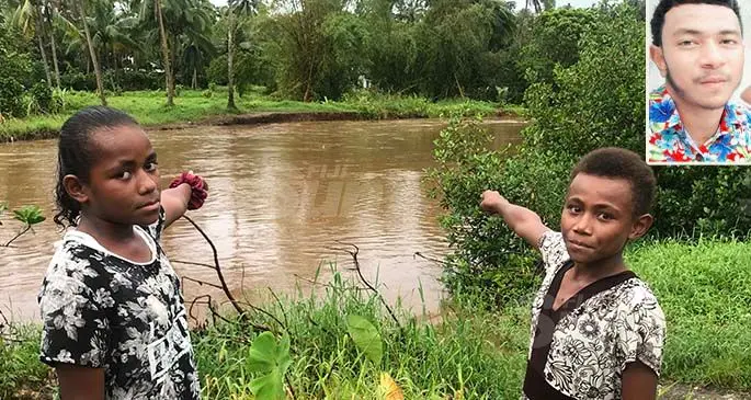 Atelaite Lomalagi, 13 (left) and Sereima Rokotina, 13, beside the river where 21-year-old Arthur Turner drowned in at Matata Settlement, Lami on February 6, 2020. (Inset: Arthur Turner). Photo: Inoke Rabonu