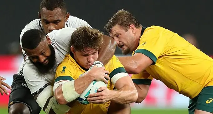 Fiji Airways Flying Fijians rep Waisea Nayacalevu tackles Wallabies captain Michael Hooper during the 2019 Rugby World Cup in Japan. Photo: World Rugby