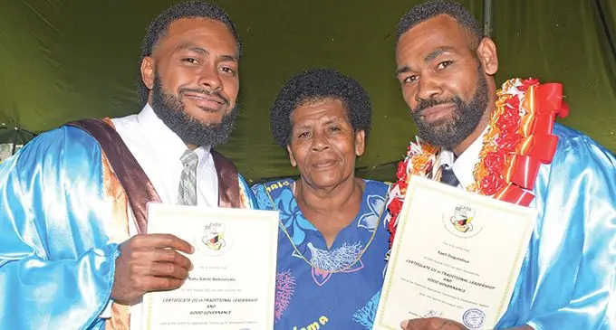 2023 Vuli-ni-Sausauvou graduates Ratu Salele Balenaivalu (left) and Epeli Dugutabua with Wainikiti Rokakalo following their graduation ceremony in Suva on August 4, 2023. Photo: Ronald Kumar