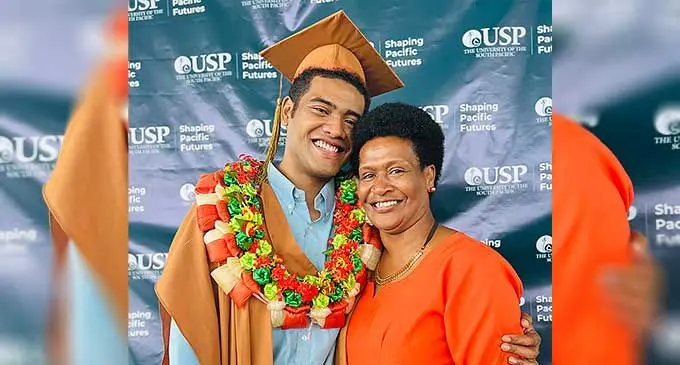Anitelu Kado with his mother Tavo Kado following his USP graduation ceremony at the Vodafone Arena in Suva on October 5. Photo: Nolishma Narayan