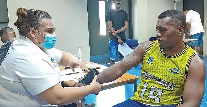 FASANOC chief executive officer Vanessa Kilner assists Etonia Saukuru during the final medical check-up at the FNU Namaka Campus, Nadi, on October 21, 2023. Photo: Waisea Nasokia