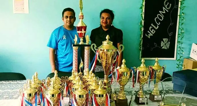 Nakasi Youth Club founder, Mohammed Shafil (left) presenting the prizes sponsored for the graduation celebrations to Sabeto College principal Shelly Chand in Nadi.
