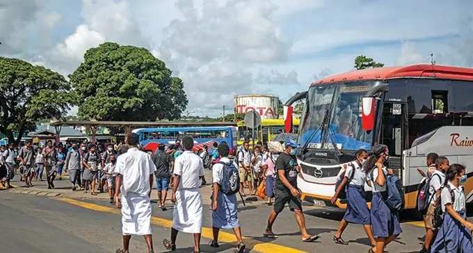 School Students at the Suva Bus Stand after school. File Photo