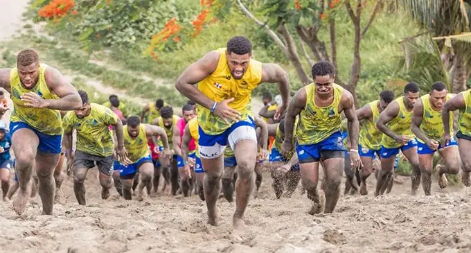 Swire Shipping Fijian Drua reps (left-right) Tevita Ikanivere, Ilaisa Droasese, Meli Tuni lead the charge during training at the Sigatoka sand dunes. Photo: Fijian Drua 