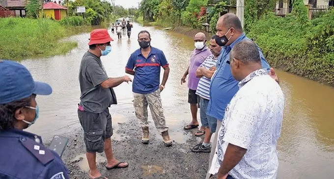 Affected Koronavia residents with Assistant Minister for Infrastructure and Disaster Management, (second from left )Vijay Nath and Commissioner Central (second from right) Josefa Navuku on January 12, 2022. Photo: Ronald Kumar       