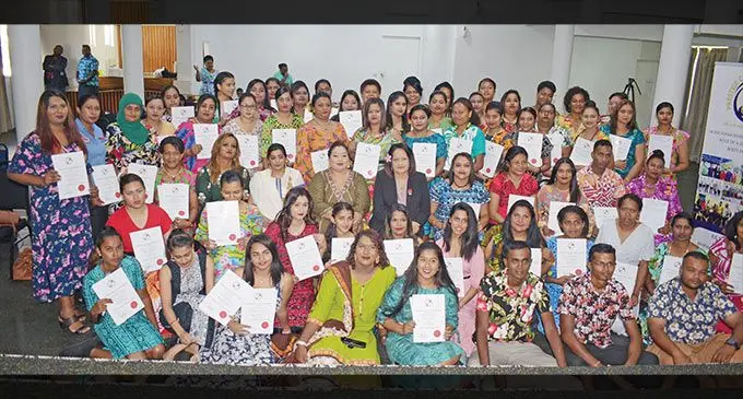 Prestige Caregivers Academy graduates with Ministry for Women, Children and Poverty Alleviation, Rosy Akbar on November 18, 2022. Photo: Ronald Kumar