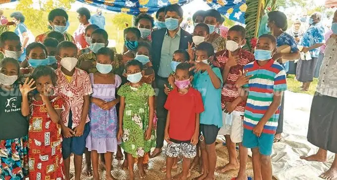 Acting Prime Minister and Attorney-General Aiyaz Sayed-Khaiyum with school children after commissioning internet connectivity for three rural schools in Cakaudrove.  Photo: DEPTFO News