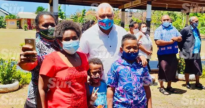 Prime Minister Voreqe Bainimarama with members of the community while on tour in the Western Division October 13, 2021. Photo: Nicolette Chambers