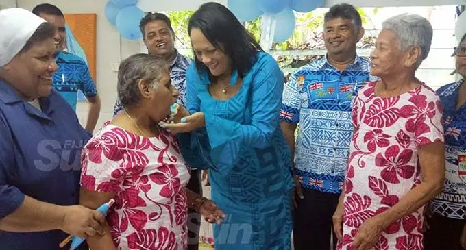 Minister Rosy Akbar with senior citizens of Father Law Home.