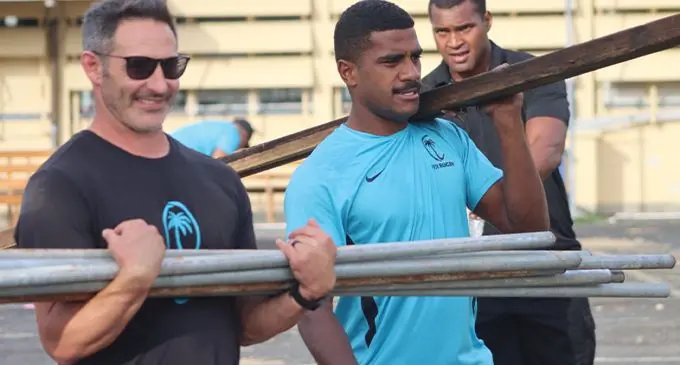 Fiji Airways Fijian 7s head coach Ben Gollings and Filipo Bukyaro during their outreach programme at the Sigatoka Hospital on May 12, 2022. Photo: FRU Media