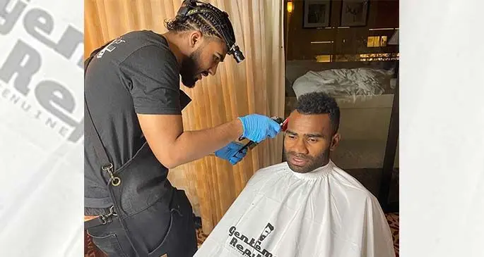 Fiji Airways Fijian 7s halfback Jerry Tuwai gets a haircut in Vancouver, Canada on March 5, 2020.