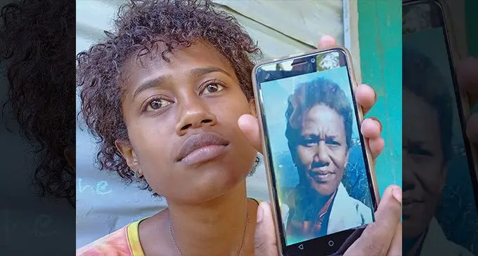 Seremana Tikoilautoka, 19, with a photo her late mother, Vitorina Bruce. Photo: Ronald Kumar