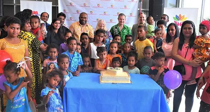 The Minister for Health and Medical Services, Dr Ifereimi Waqainabete, with the staff and volunteers of the Sai Prema Foundation, with the children and their parents that have been helped by the foundation.