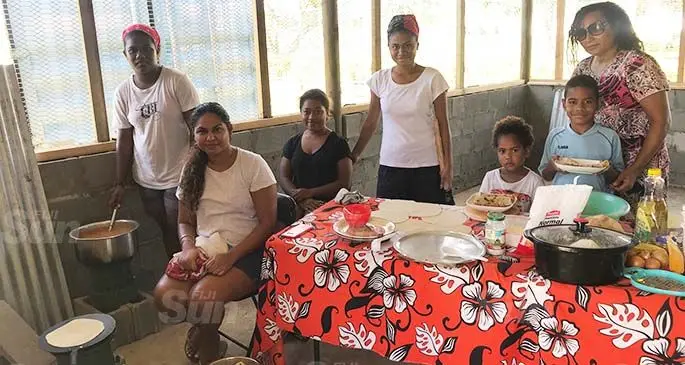 Fiji-born Australian citizen Birisita Ratubalavu (with shades) with her team preparing lunch for children at Korociri in Nadi. Photo: Waisea Nasokia