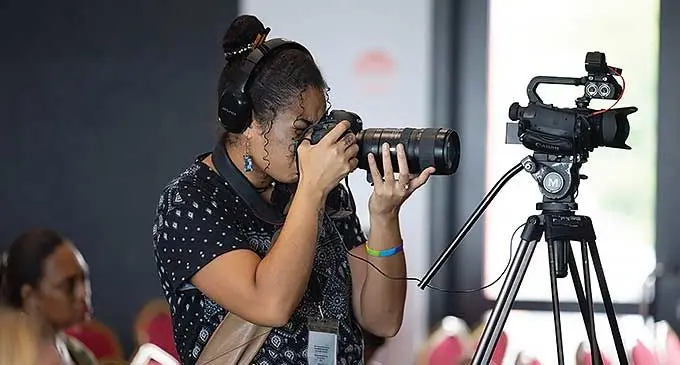 A female journalist during the International Women’s Day at Harbour Point in Lami. Photo: Kelera Tuisawau