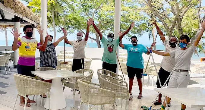 Some staff members of Sofitel Fiji Resort and Spa working on the final touches around the restaurant area.