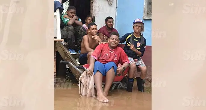 Salacieli Utoniyaya, Wilson Chute, Esa Gerald, Semi Macawa, Sitiveni Namua and Luisa Tabia in front of their home in Block 10 Naodamu on February 2, 2021. Photo: Laisa Lui