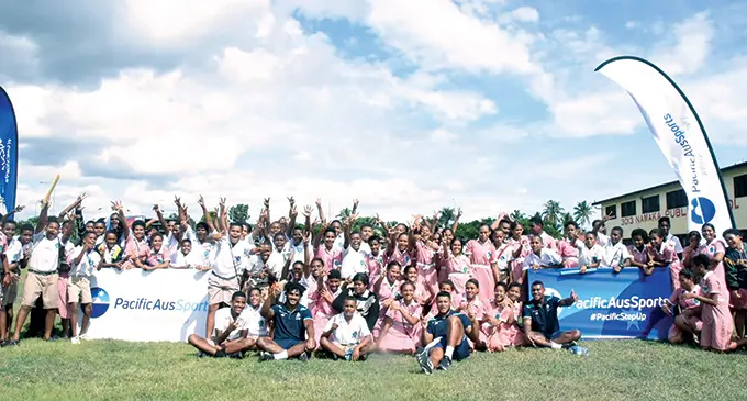 Swire Shipping Fijian Drua players with students of Namaka Public School, Nadi, on May 25, 2022. Photo: Waisea Nasokia