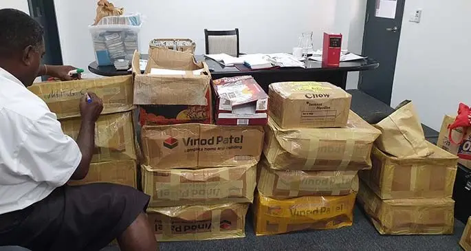 Boxes containing passports confiscated.