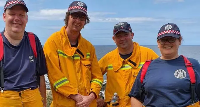 Sylvia Chand (right) with fellow firefighters.