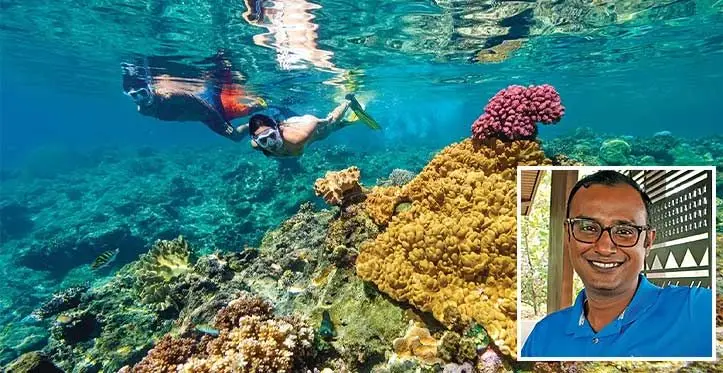 A couple on Holiday in Fiji. Photo: Tourism Fiji/ Inset: Fiji Marriott Resort Momi Bay rooms division manager, Shujoy Jha.