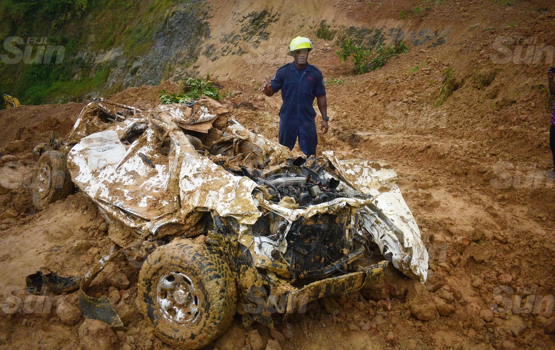 Fireman, Roseru Tikonabua shows where the body of the two of three man died in landslide were found at Mau Quarry site in Navua on March 20, 2020. Photo: Ronald Kumar.