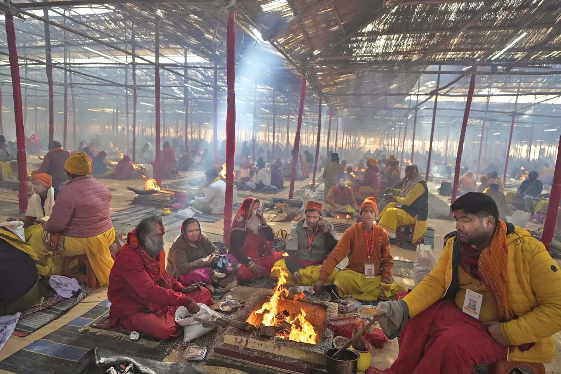 Hindu devotees perform rituals awaiting the opening of a temple dedicated to Lord Ram in Ayodhya, India on January 22, 2024. Photo: AP
