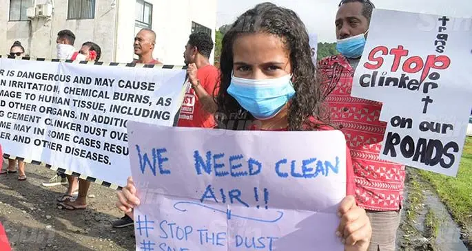 Karamia Philip, 10 , with other Lami residents take part in a protest to raise their concern on dust emissions from the cement factories in Lami on April 10, 2021. Photo: Ronald Kumar