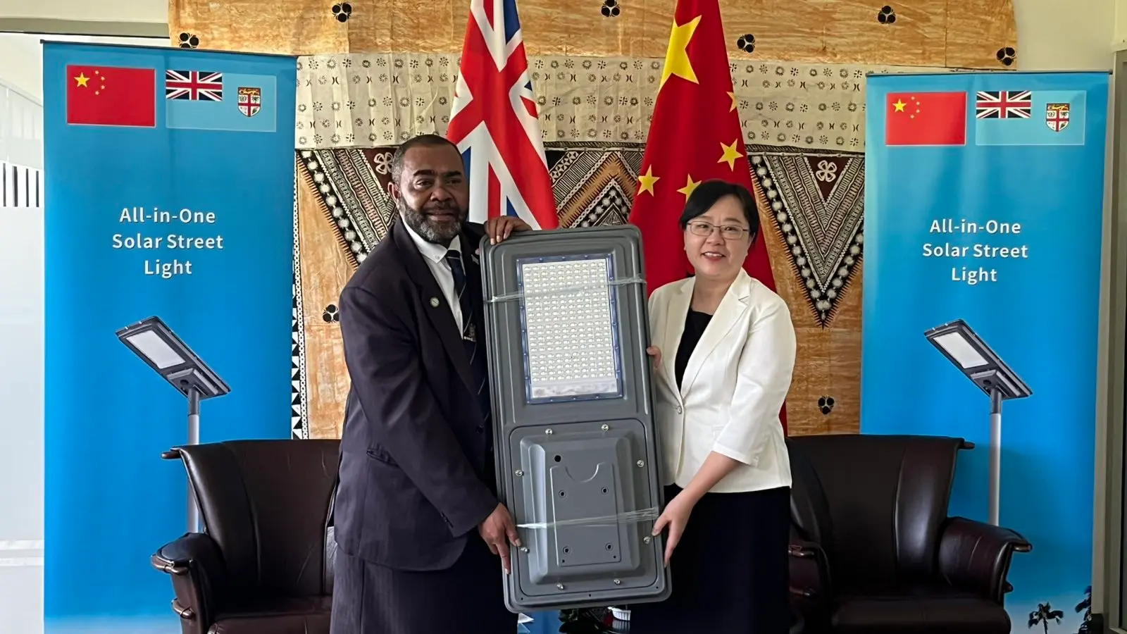 Acting Minister for Housing and Local Government, Hon. Mosese Bulitavu, and Guangdong Province Vice Governor Zhang Guozhi during the handover of solar lights on September 15, 2026.