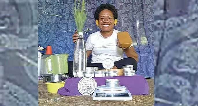 Laisani Waqaiquma with home-made herbal body balm products.