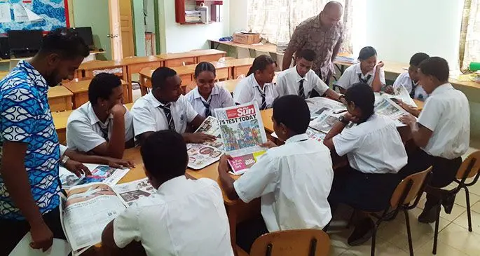 Christian Mission Fellowship College students and teachers using the Fiji Sun in class. The college is a participant in the Fiji Sun’s Newspapers in education programme for senior students.