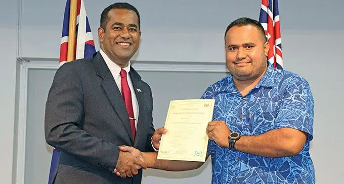 Acting Minister for Employment, Productivity and Industrial Relations Filimoni Vosarogo and Pene Savea during the farewell ceremony on March 16, 2023. Photo: Jone Salusalu