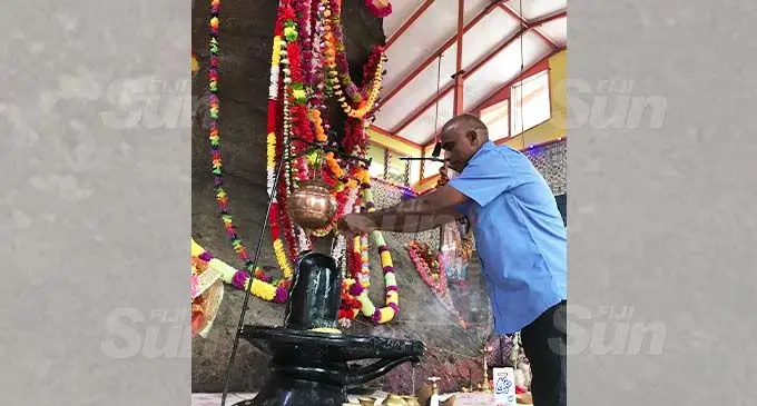 Nagigi Naag Mandir caretaker, Rajendra Prasad, offering prayers to Naag Baba (snake god) during the Nash Panchami celebration at the temple in Labasa on November 11, 2020. Photo: Shratika Naidu