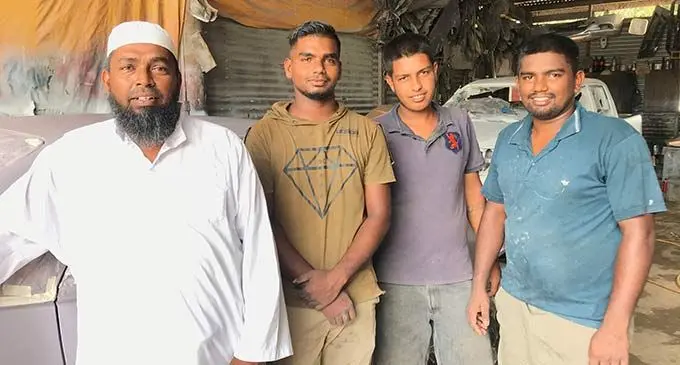 Abdul Muktar (left) with his staff members Abdul Muktar, Ravneel Kumar and Rakhid Khan at Abdul Muktar Motors in Labasa on November 17, 2022. Photo: Shratika Naidu