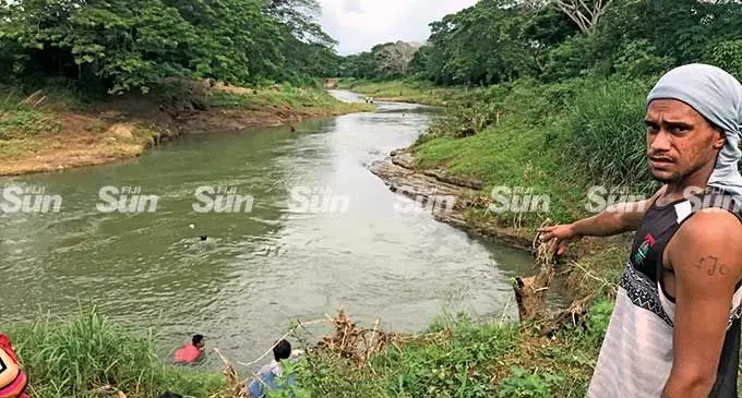 Marika Raituku points to the spot where his niece was found floating at the Vatutu River in Nadi on March 23, 2022. Photo: Waisea Nasokia
