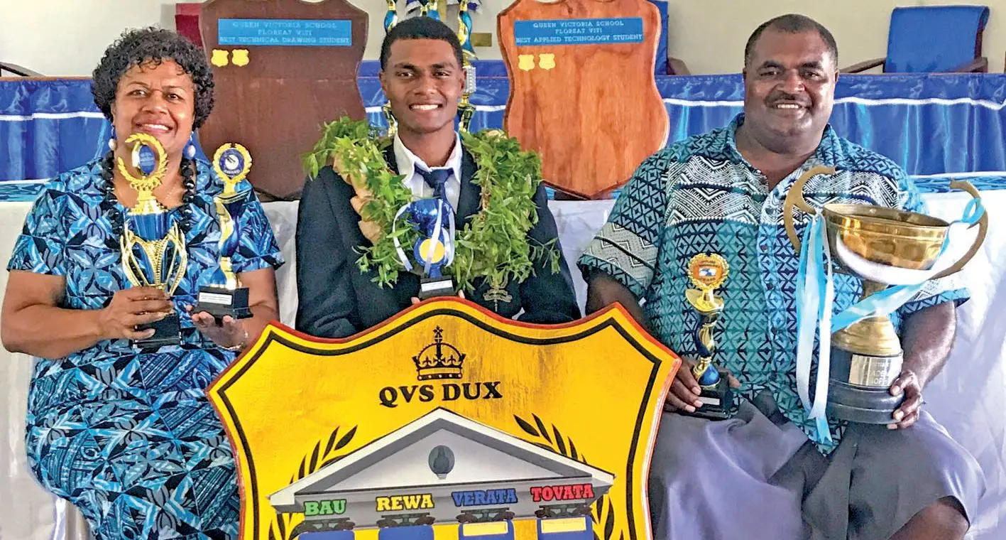 Queen Victoria School dux, Tevita Dauvakatini with his parents Jeremaia and Asinate Lewaravu. Photo: Kelera Sovasiga