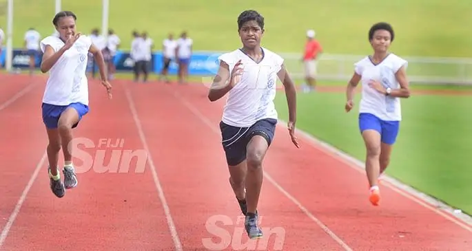 Merecani Nacaru (middle) won the inter-girls 100meters heats during St Joseph Secondary School trails at ANZ Stadium on February 8, 2020. Photo: Ronald Kumar.