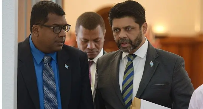 Minister for Agriculture Mahendra Reddy (left) and Attorney General Aiyaz Sayed-Khaiyum outside Parliament on February 12, 2019. Photo: Ronald Kumar.