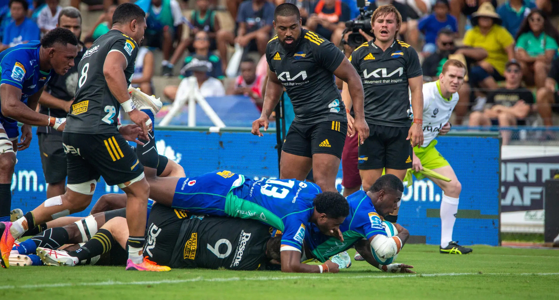 Swire Shipping Fijian Drua winger Taniela Rakuro is driven over the tryline by centre Iosefo Masi (13) to score the first try against the Hurricanes at the HFC Bank Stadium in Suva on May 6, 2023. The duo again combined for Rakuro to score his second try in the Drua’s 27-24 win in the Shop N Save Super Rugby Pacific match. Photo: Leon Lord.